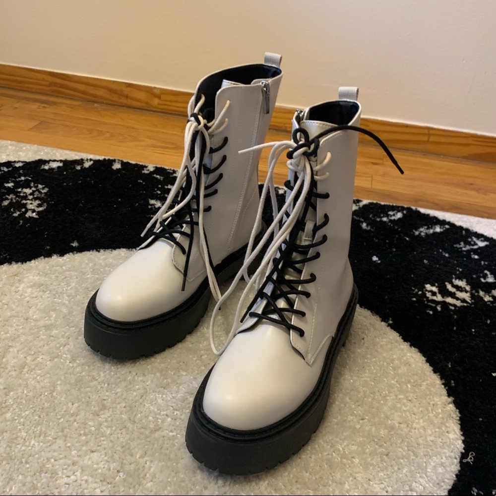 White and black boots